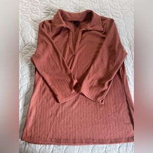 Women's Ribbed long sleeved top in an earthy rust color